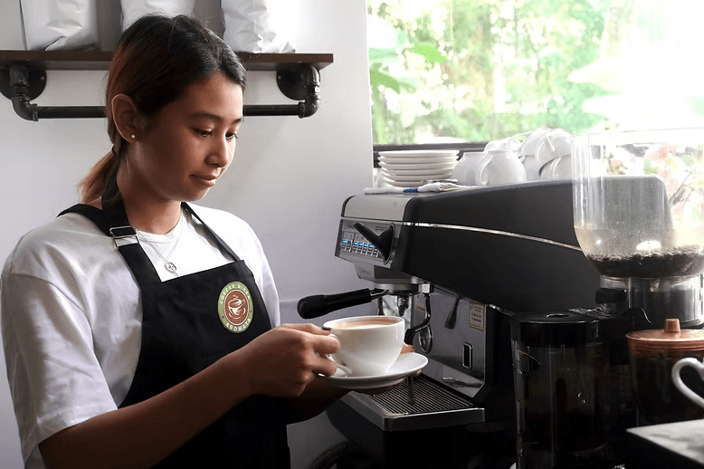 Barista at the espresso station
